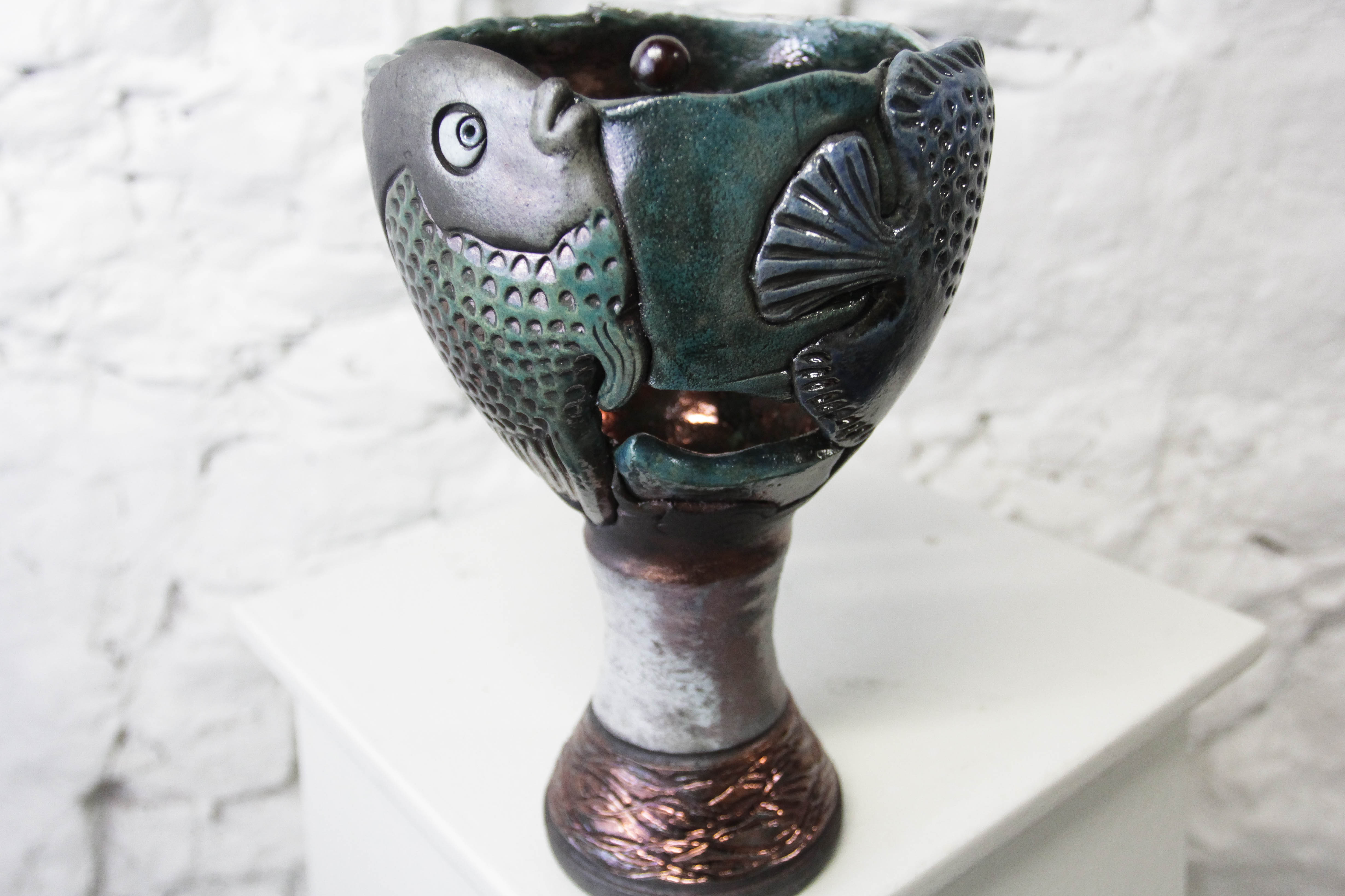 3Pecestal Fish Vase, $175, 459312